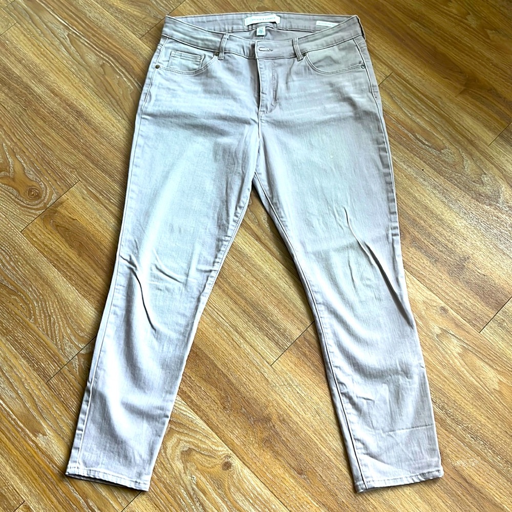 Gently worn Neutral Stretch Jean. Small spot on front leg pictured.